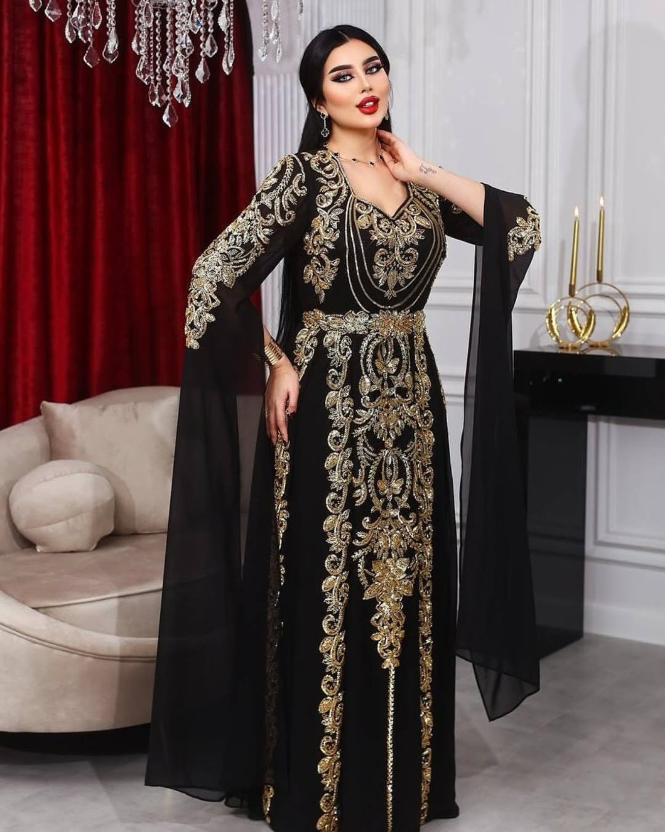 Luxury black Moroccan kaftan dress with gold hand embroidery, bell sleeves, and belted waist